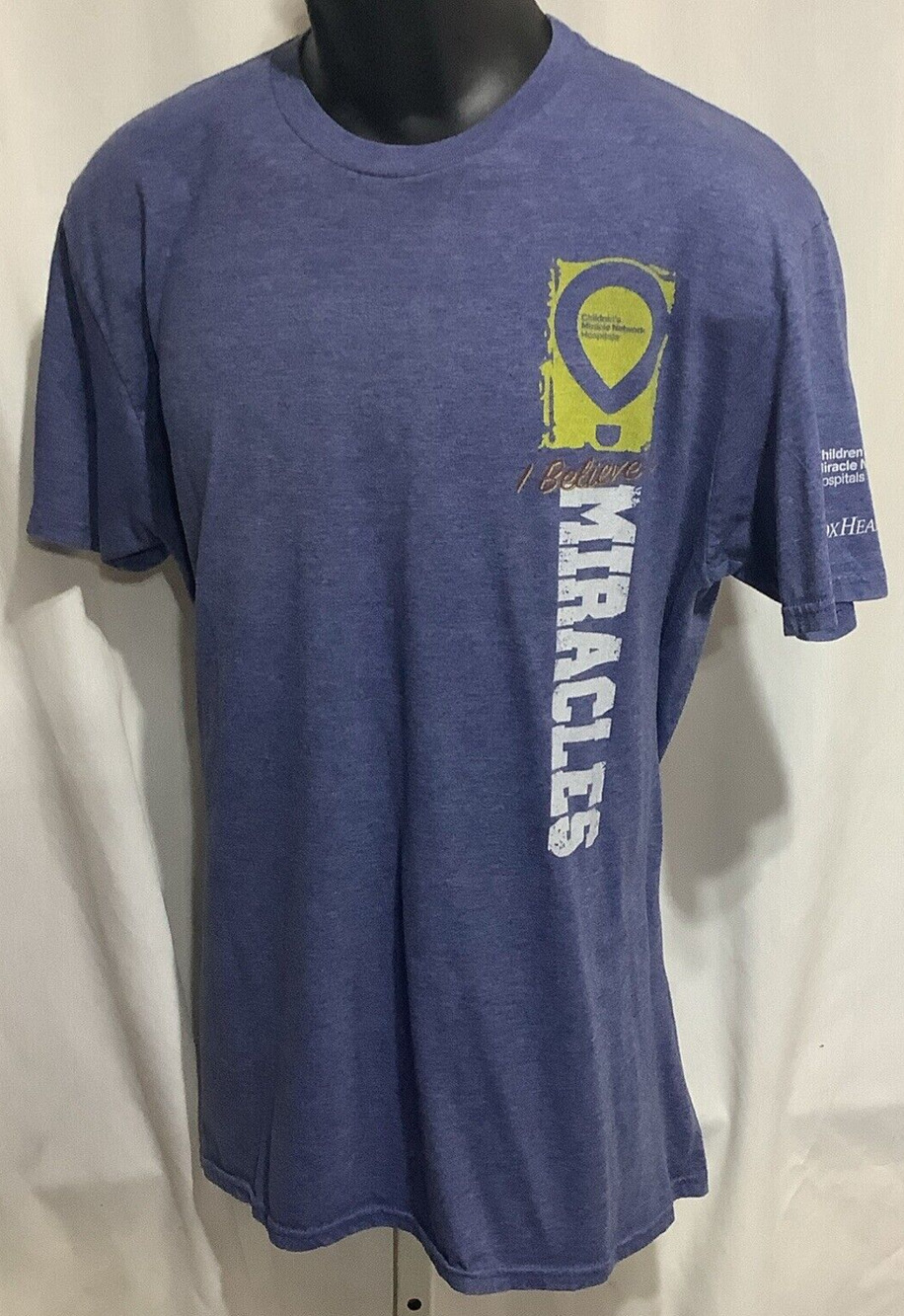 Childrens Miracle Network T  XL Blue CoxHealth I Believe In Miracles Graphic Tee